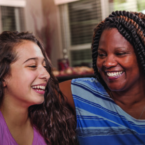 Woman and kid laughing